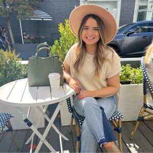 Cream sleeveless sweater